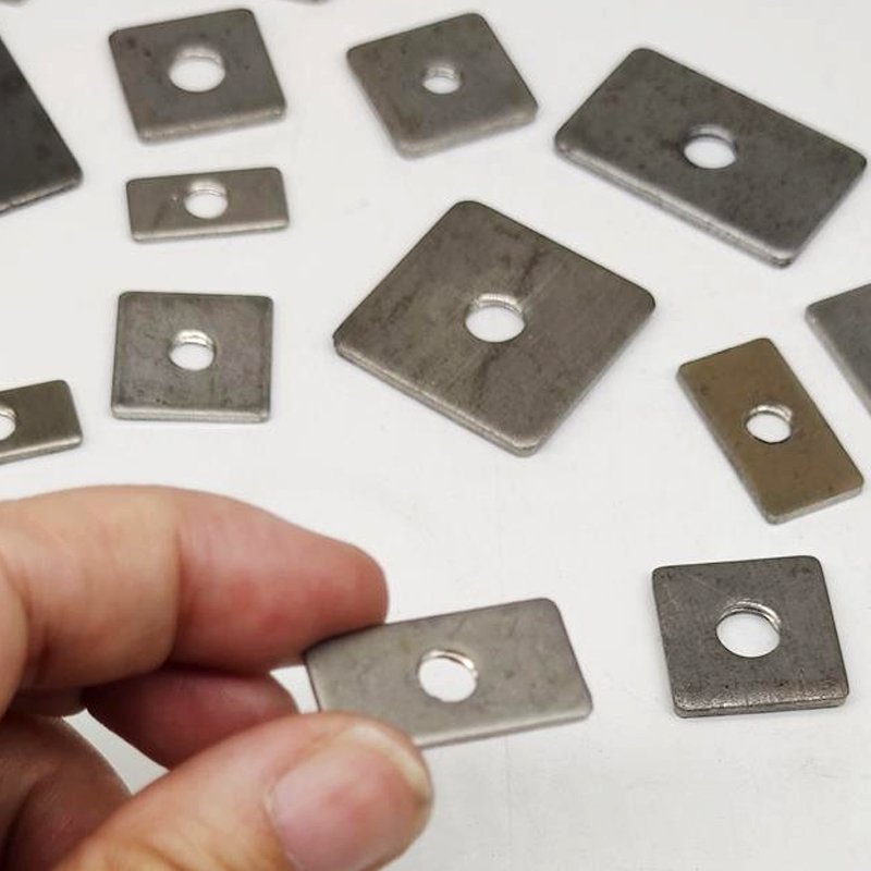 Tapping of Flat Threaded Holes on Stainless Steel Square End Caps